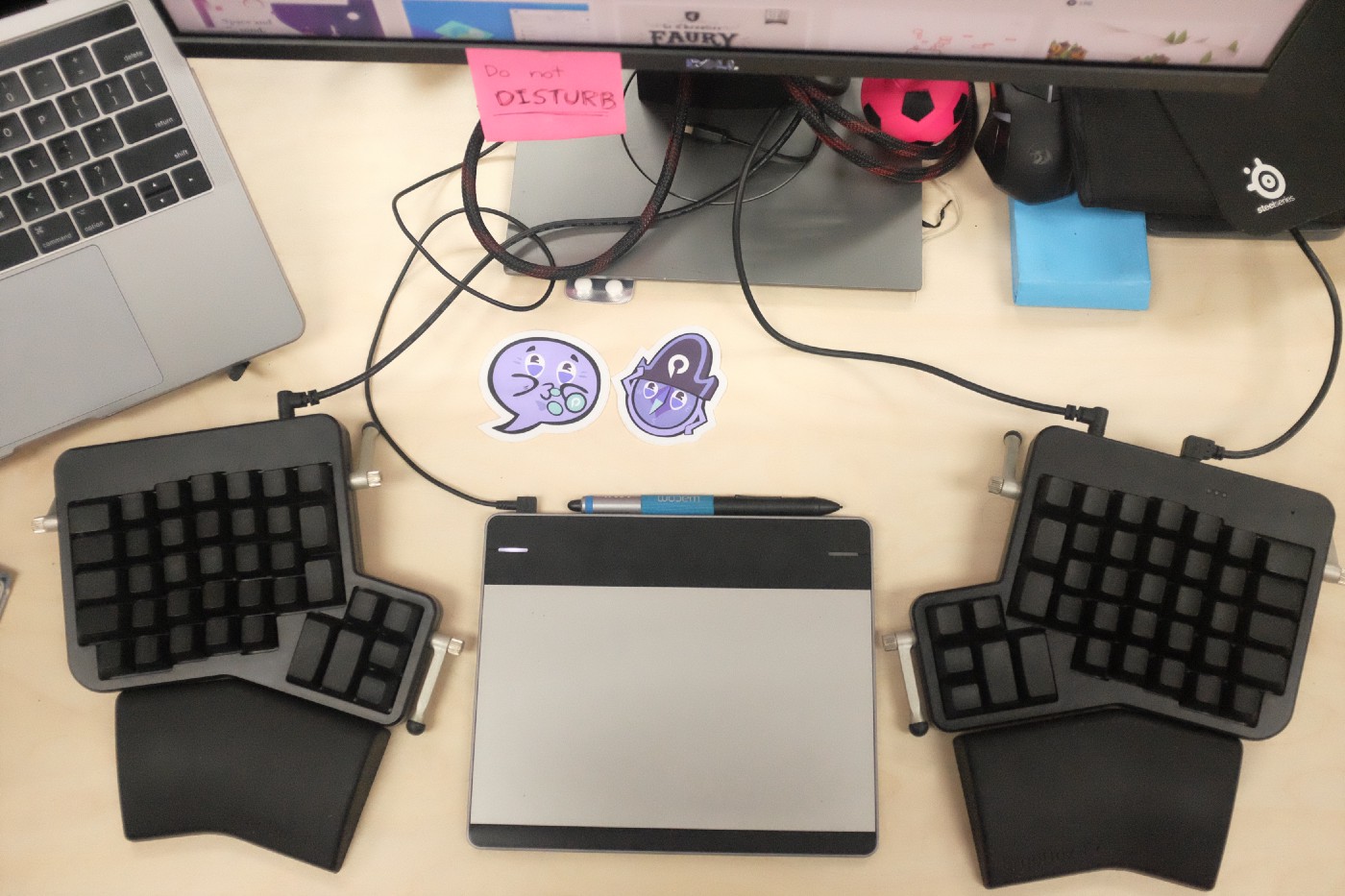 A photo of my keyboard and graphic tablet